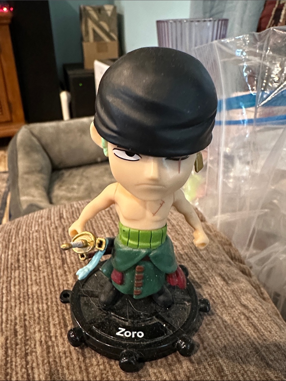 Zoro Anime Figure with Green Outfit and Black Bandana